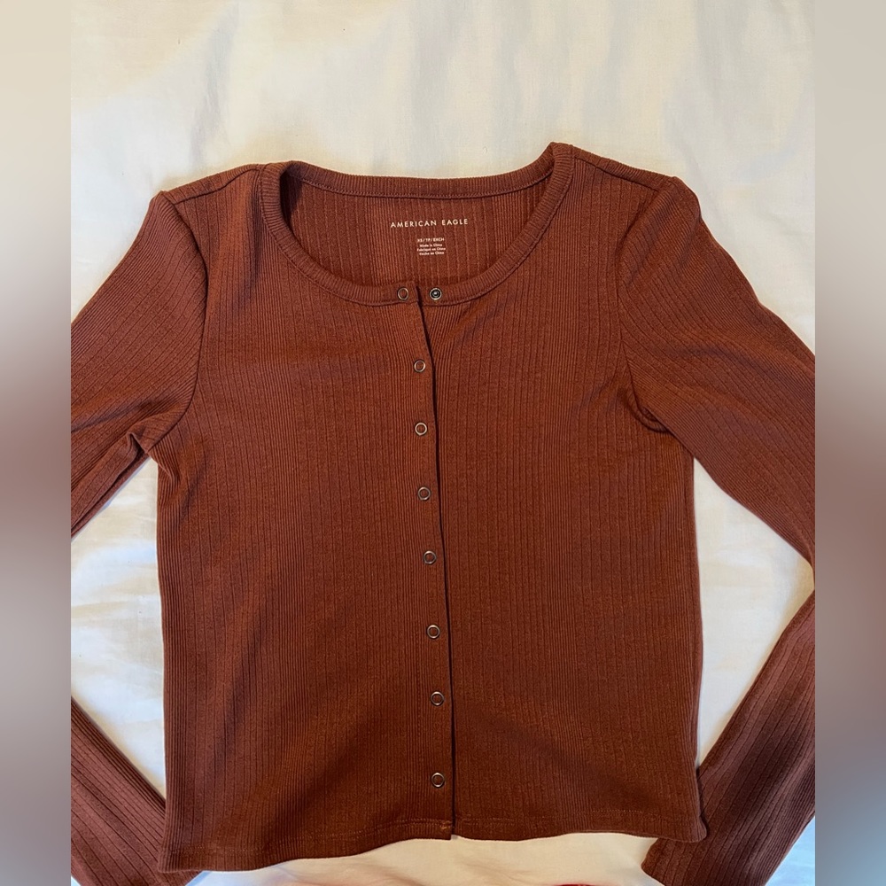 Brown/orange long sleeve.